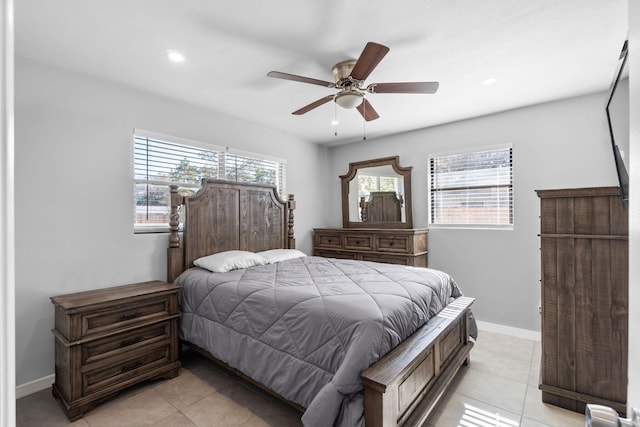 bedroom featuring ceiling fan and light tile patterned floors