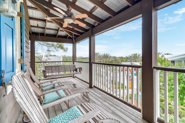 wooden deck with ceiling fan