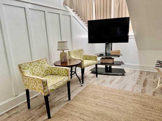 living area featuring hardwood / wood-style floors