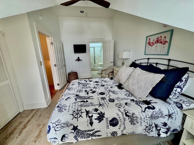 bedroom featuring ensuite bathroom, high vaulted ceiling, ceiling fan, and light hardwood / wood-style floors