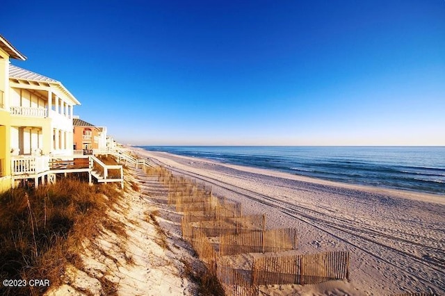 property view of water featuring a beach view