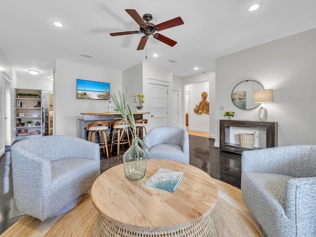 living room featuring ceiling fan