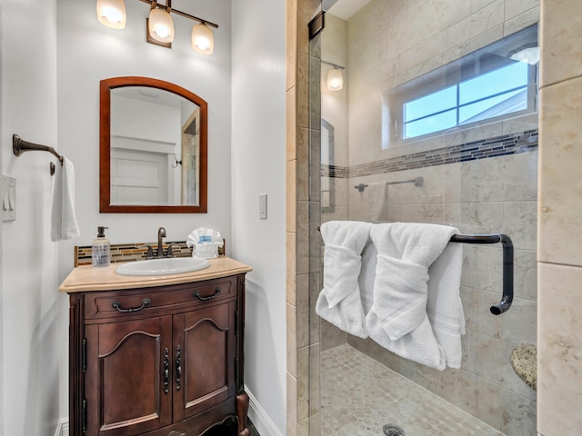 bathroom with vanity and an enclosed shower