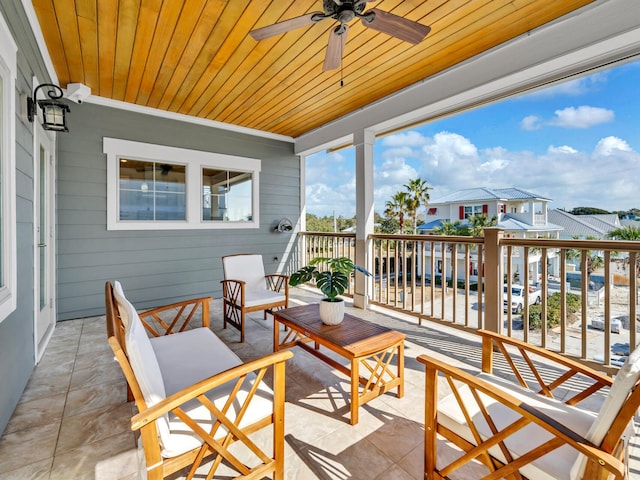 view of patio featuring ceiling fan