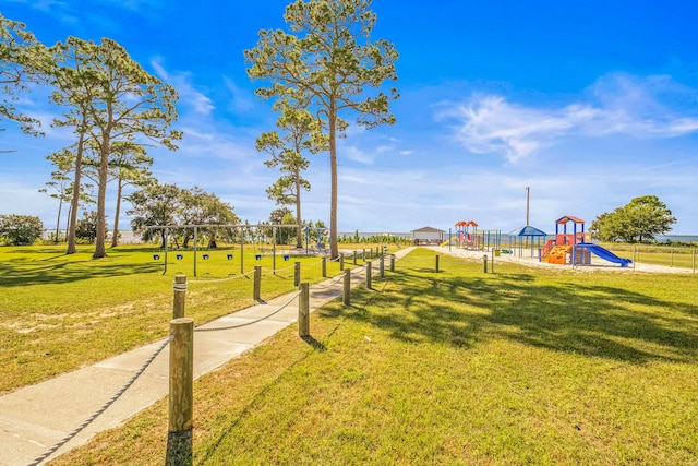 view of jungle gym with a yard