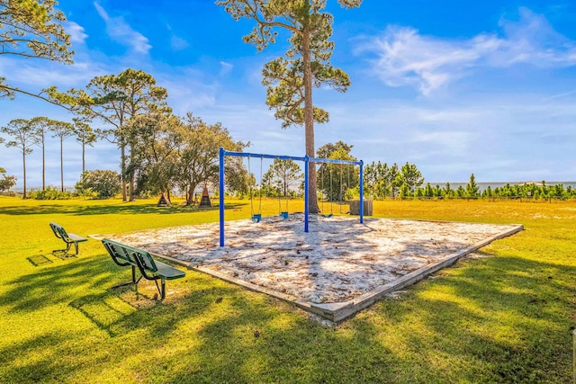 view of playground featuring a yard