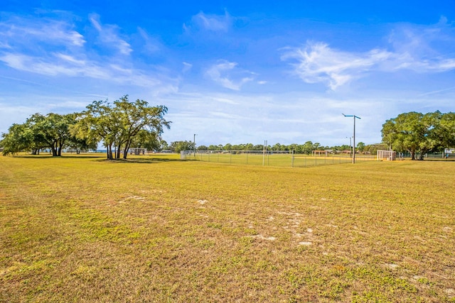 view of yard with a rural view