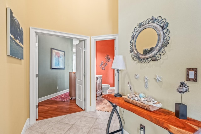 hallway with light tile patterned floors