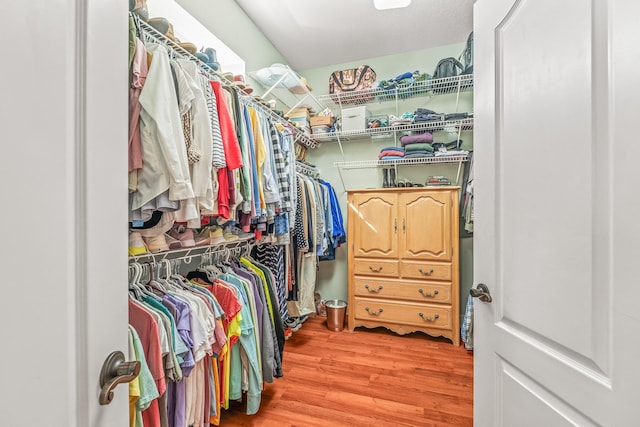 walk in closet featuring light wood-type flooring