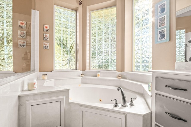 bathroom featuring tiled bath