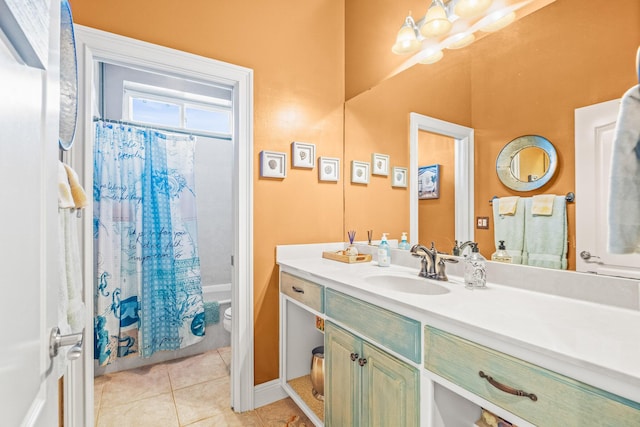 full bathroom with vanity, tile patterned floors, toilet, and shower / tub combo with curtain