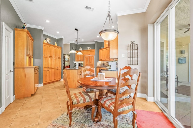 tiled dining space with ornamental molding