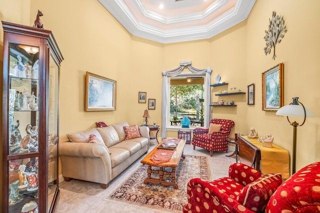 living room with crown molding, a towering ceiling, and light tile patterned floors