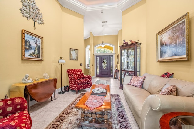 living room featuring ornamental molding and light tile patterned floors