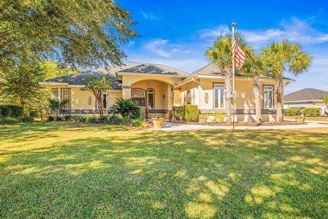 view of front of house with a front lawn