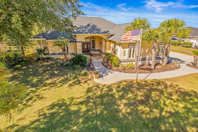 view of front of home with a front yard