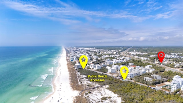 drone / aerial view with a view of the beach and a water view