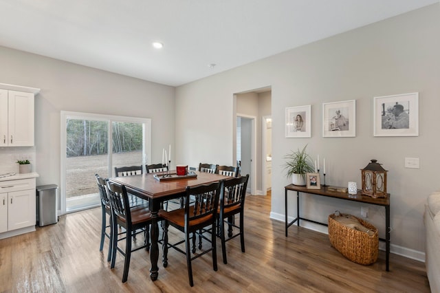 dining room with light hardwood / wood-style floors