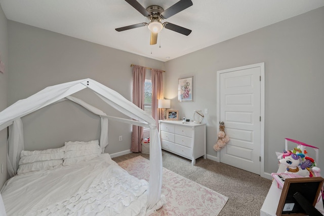 bedroom with ceiling fan and light carpet