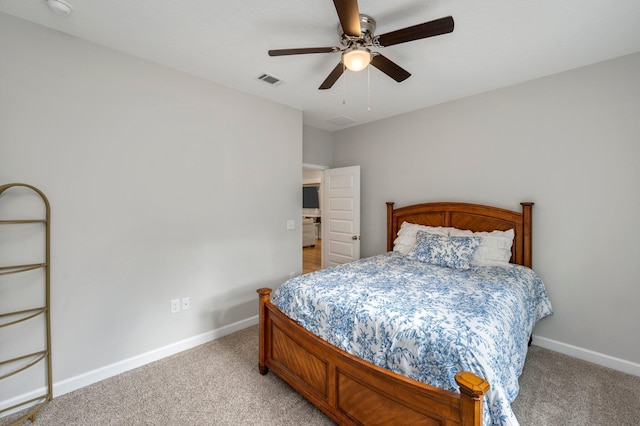 carpeted bedroom with ceiling fan