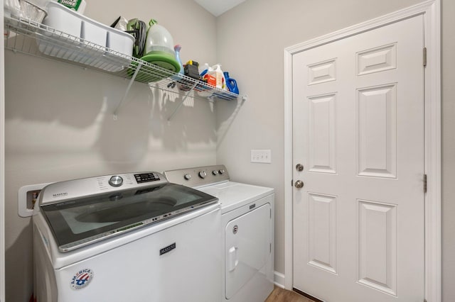 laundry room featuring washing machine and dryer