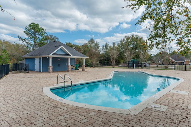 view of pool featuring a patio area