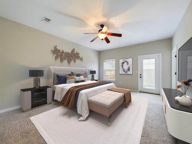 bedroom with ceiling fan, access to outside, and light carpet