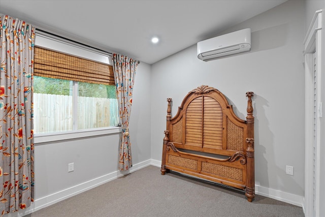 interior space with recessed lighting, baseboards, carpet flooring, and a wall mounted AC