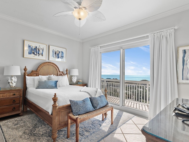 tiled bedroom with crown molding, ceiling fan, access to exterior, a water view, and a beach view