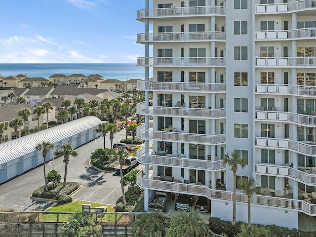 view of building exterior with a water view