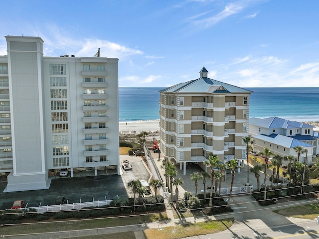 view of building exterior with a water view