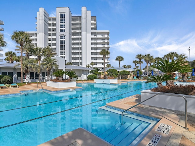 view of pool featuring a patio area