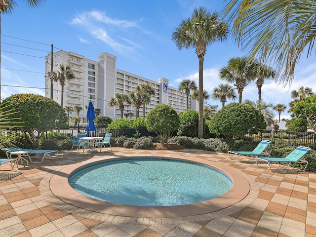 view of swimming pool featuring a patio