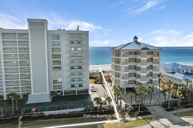 view of building exterior with a water view