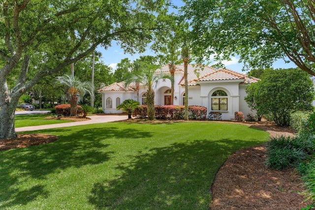 416 Admiral Ct, Destin, FL 32541 - mediterranean / spanish home with a tile roof, a front yard, and stucco siding