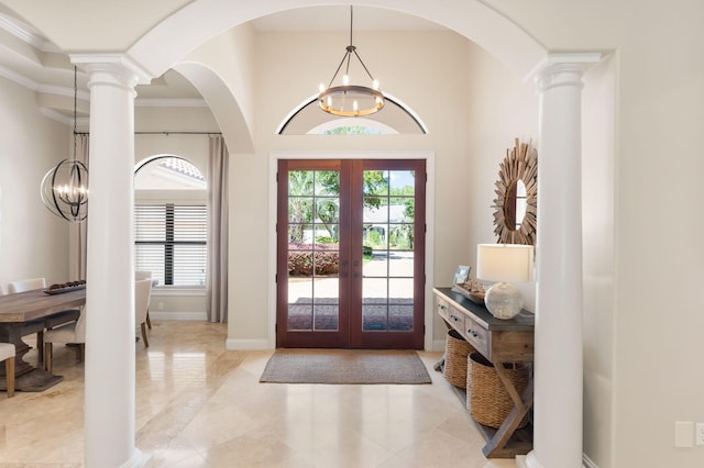 416 Admiral Ct, Destin, FL 32541 - entryway featuring a chandelier, french doors, ornate columns, and ornamental molding