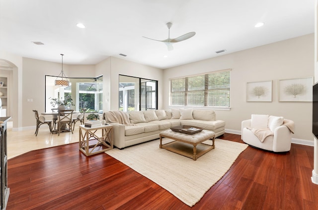 416 Admiral Ct, Destin, FL 32541 - living area featuring arched walkways, a ceiling fan, plenty of natural light, wood finished floors, and recessed lighting