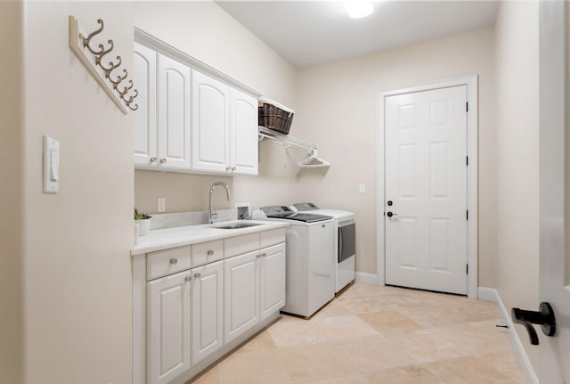 416 Admiral Ct, Destin, FL 32541 - laundry area with washer and dryer, cabinet space, and baseboards