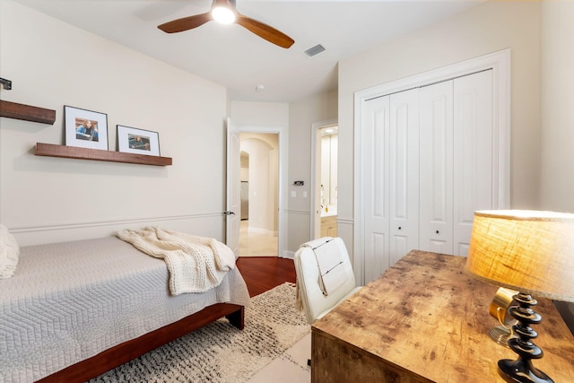 416 Admiral Ct, Destin, FL 32541 - bedroom featuring a closet, arched walkways, and ceiling fan