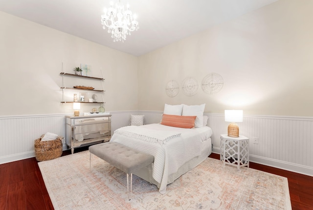 416 Admiral Ct, Destin, FL 32541 - bedroom with wood finished floors, a wainscoted wall, and a chandelier