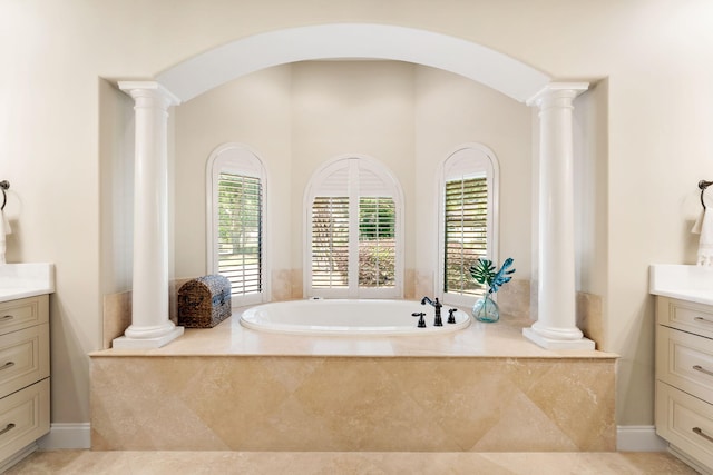 416 Admiral Ct, Destin, FL 32541 - full bathroom with vanity, ornate columns, and a bath
