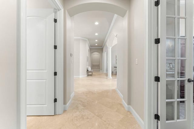 416 Admiral Ct, Destin, FL 32541 - hall with arched walkways, crown molding, baseboards, and recessed lighting