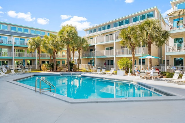 view of swimming pool with a patio area