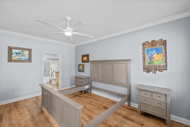 bedroom featuring ensuite bath, ornamental molding, and light hardwood / wood-style floors