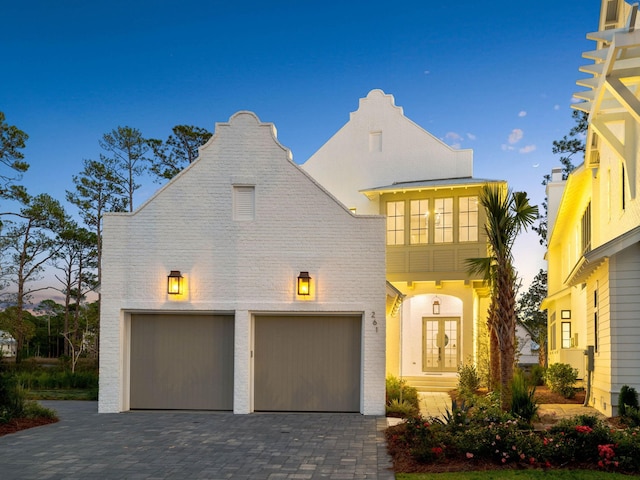 view of front of home with a garage