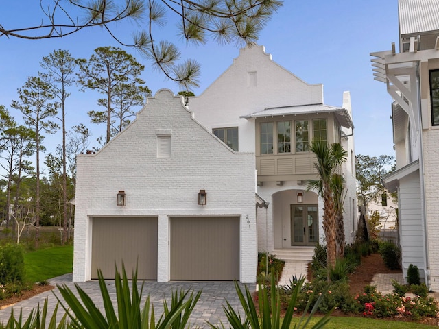 view of front of property with a garage