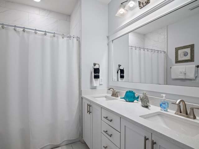 bathroom with vanity and a shower with curtain