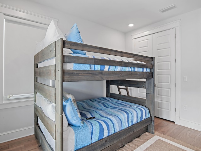 bedroom featuring wood-type flooring