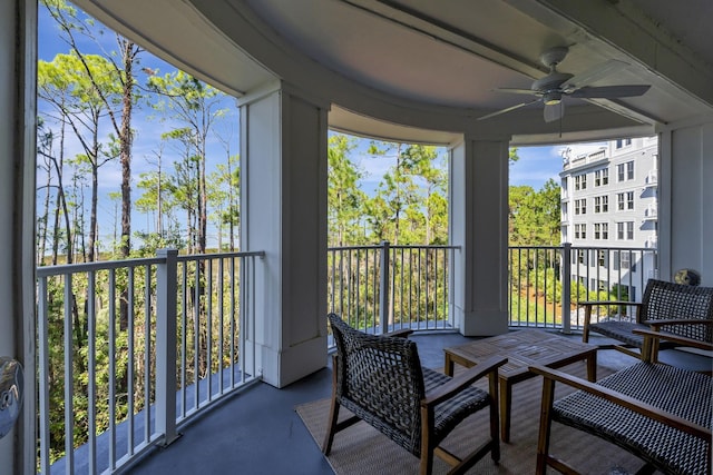 balcony featuring ceiling fan