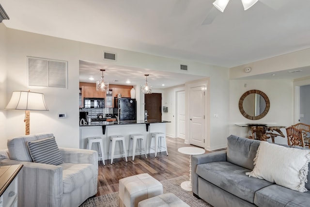 living room featuring hardwood / wood-style flooring